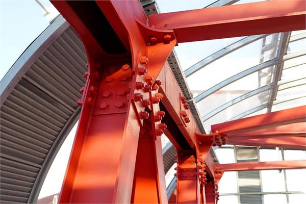 A bridge coated in red with using the new molecule of Advancion