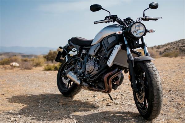 A stylish motorbike on a dusty off-road terrain