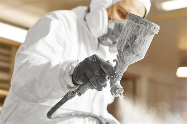 A coated applying paint by spraying