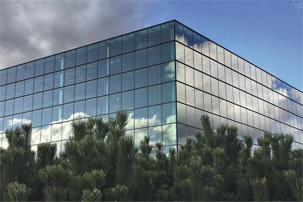 Glass-window building under the sun