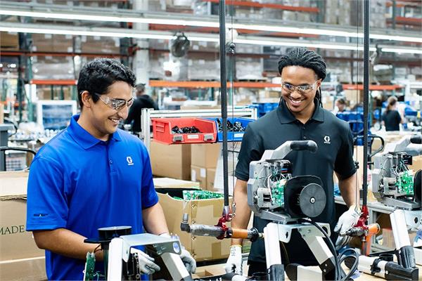 Graco Workers in a production facility