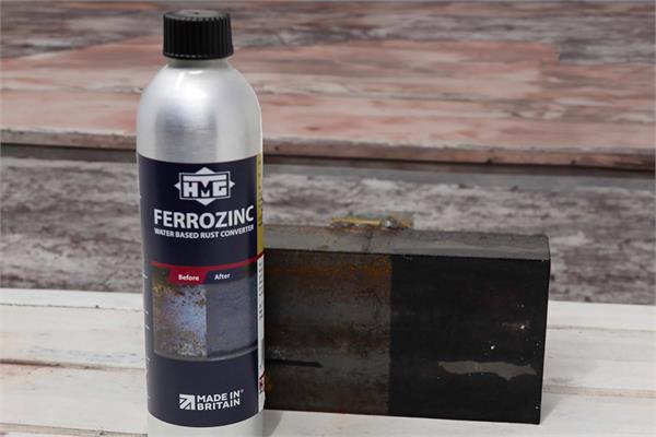 A bottle of Ferrozinc rust converter from HMG Paints