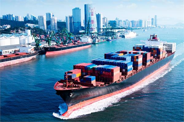 A cargo ship sailing near the coast