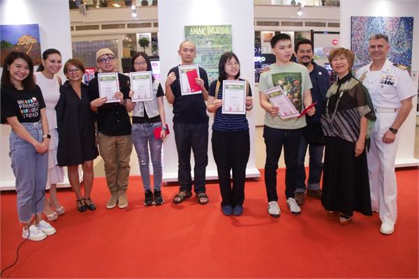 The autistic artists at the exhibition in Malaysia
