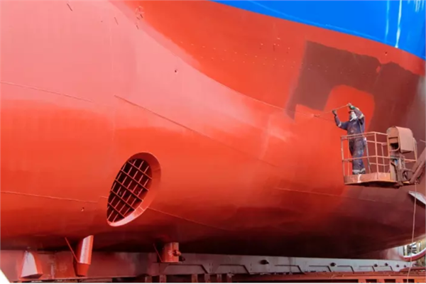 Application of a red coating on a vessel