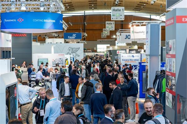 Visitors among the booths at PainExpo 2024