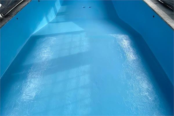 The bottom of a pool coated with Carbonamine